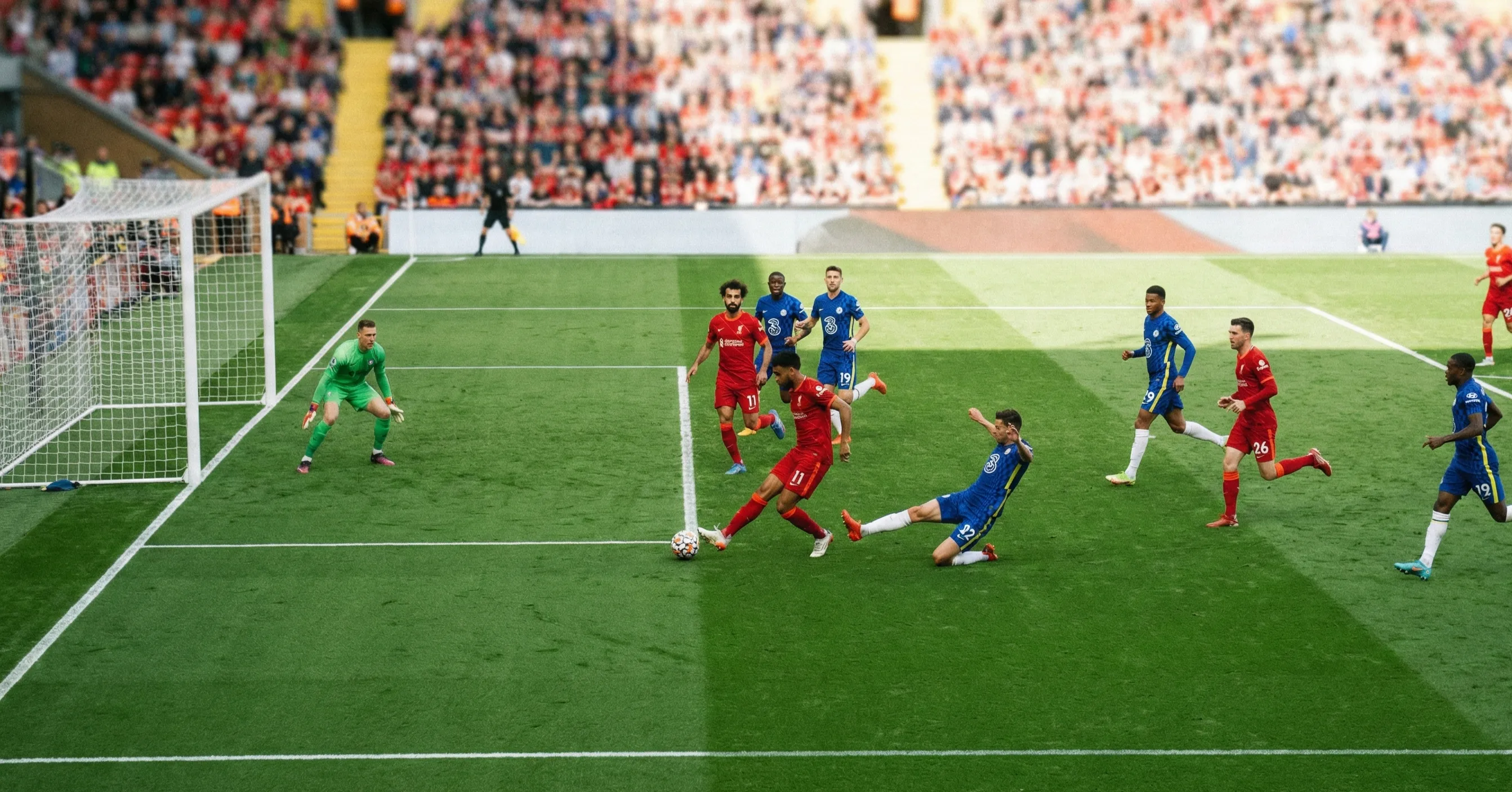 Football match with attacking players from both teams creating goal-scoring opportunities